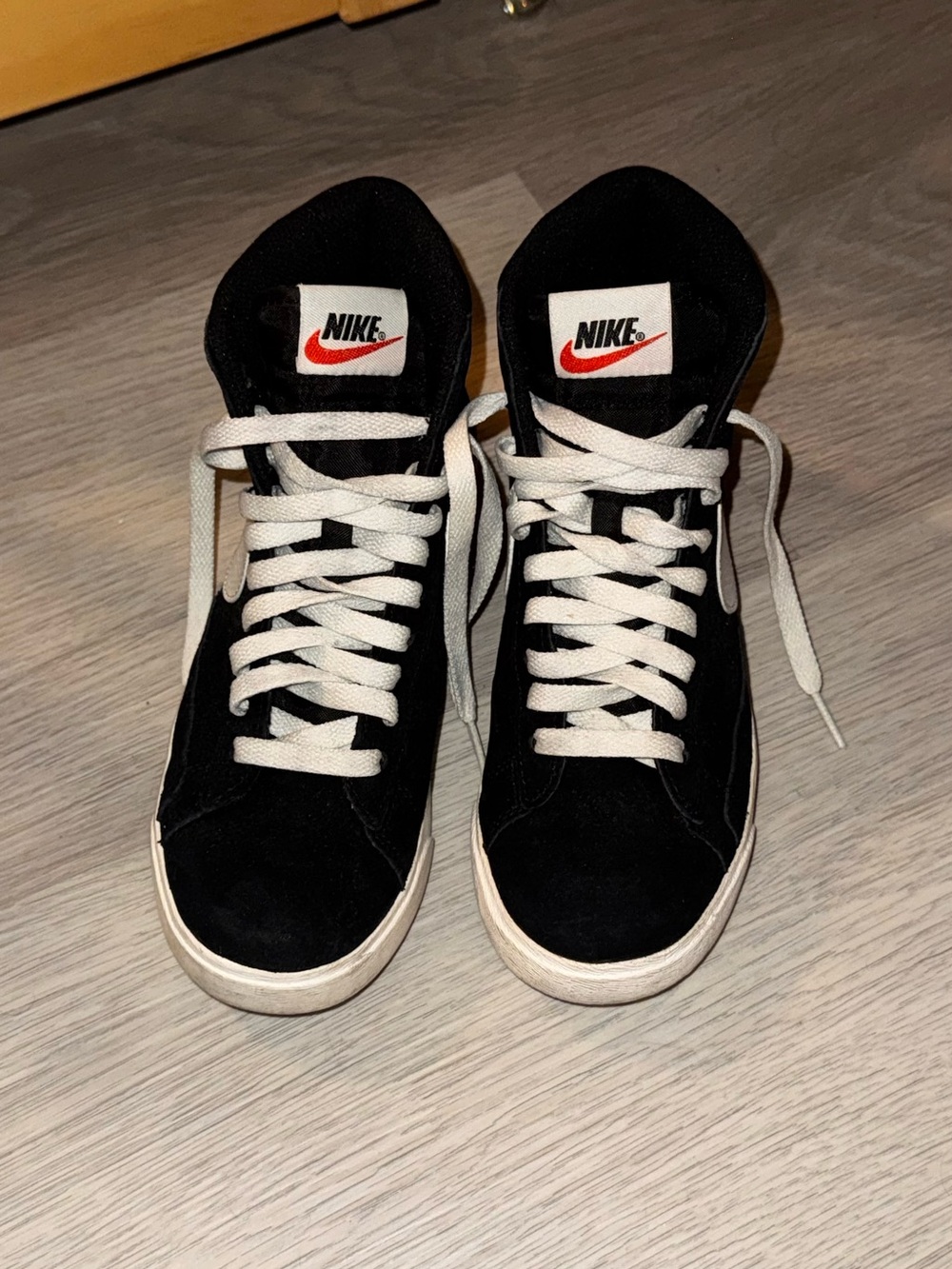 Nike Black High-Top Sneakers with White Laces and Red Logo